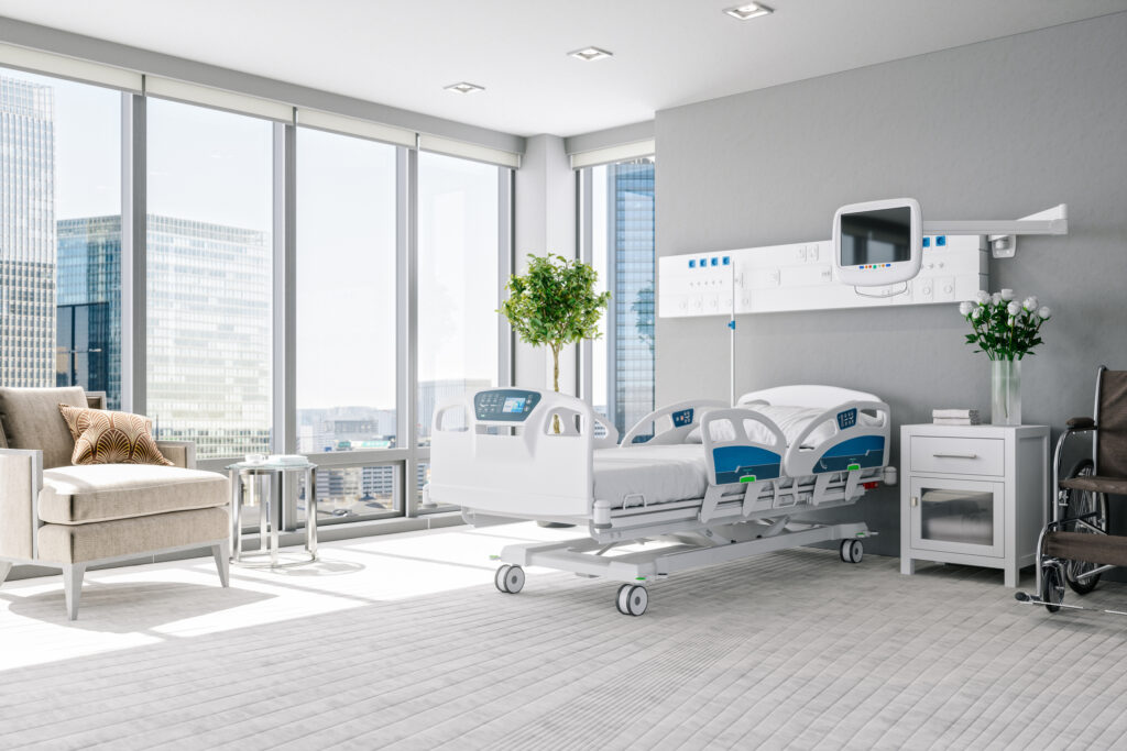 Une chambre d'hôpital individuelle et très moderne, avec beaucoup de luminosité.